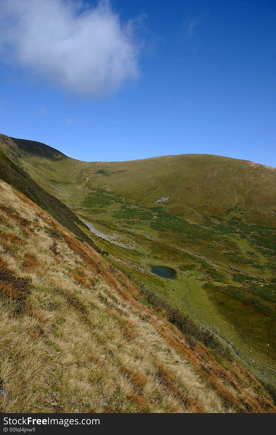 Beautiful landscape in green Carpatian mountains with hills