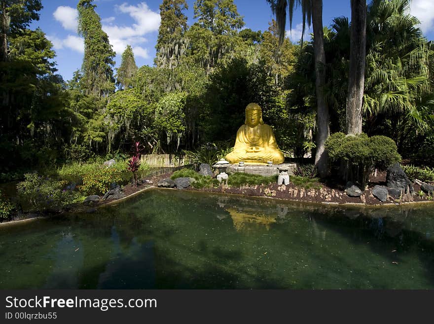 Yellow Buddha in the lake