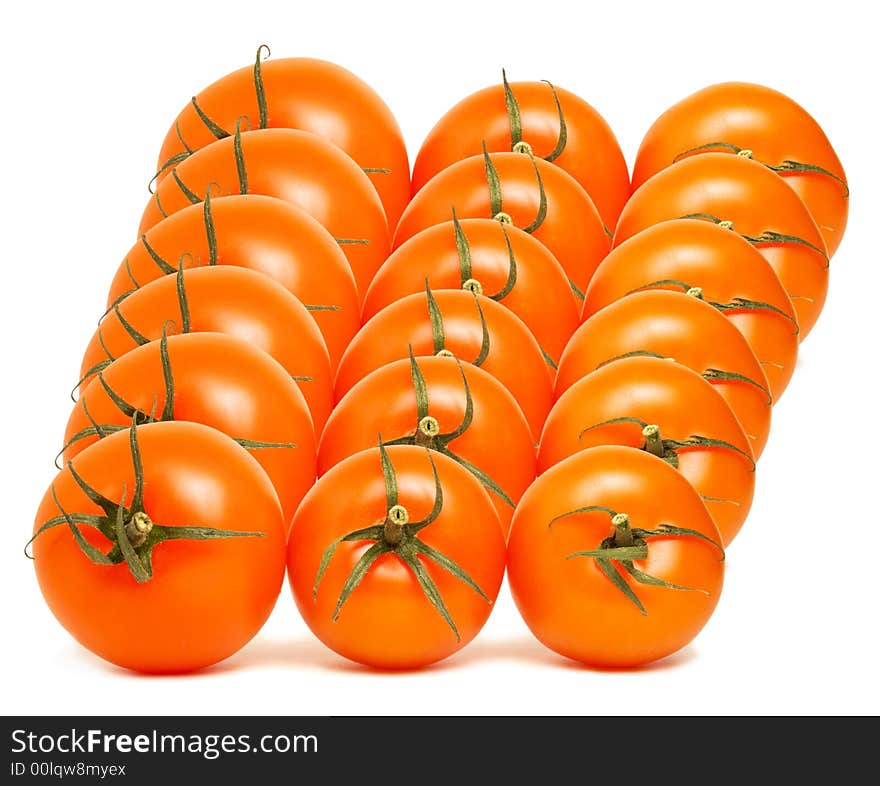 Red round tomato array on white background. Red round tomato array on white background.