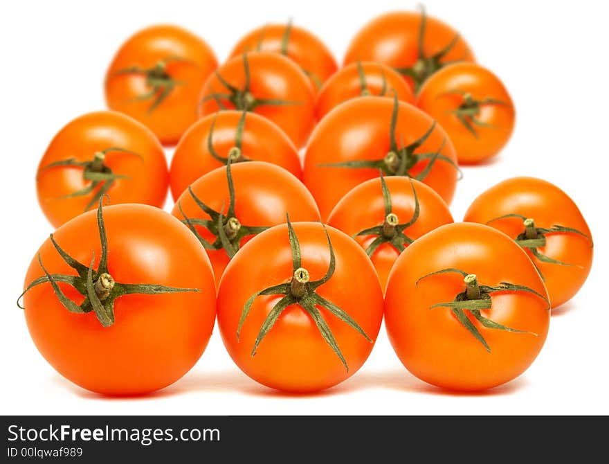 Pile of  red round tomatoes on white background. Pile of  red round tomatoes on white background