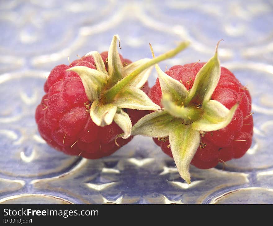 Raspberry on a dark blue background