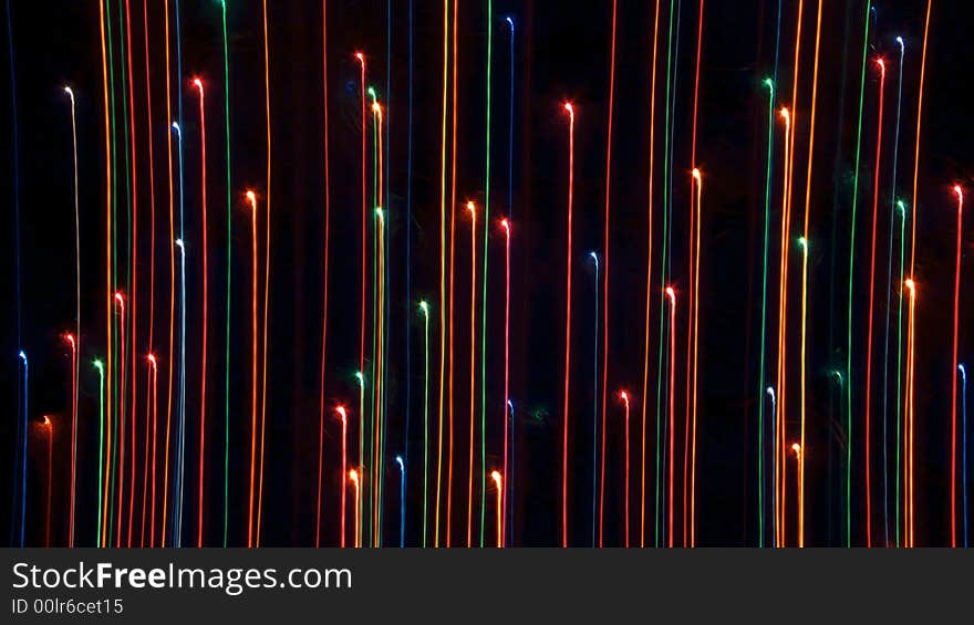 Different lights on a black background. Lifted in motion. A variety of form 
Fluorescent traces. Different lights on a black background. Lifted in motion. A variety of form 
Fluorescent traces.