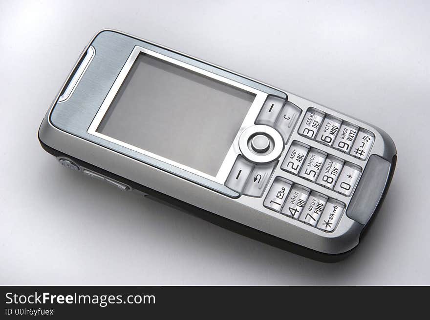 Mobile phone on a grey background