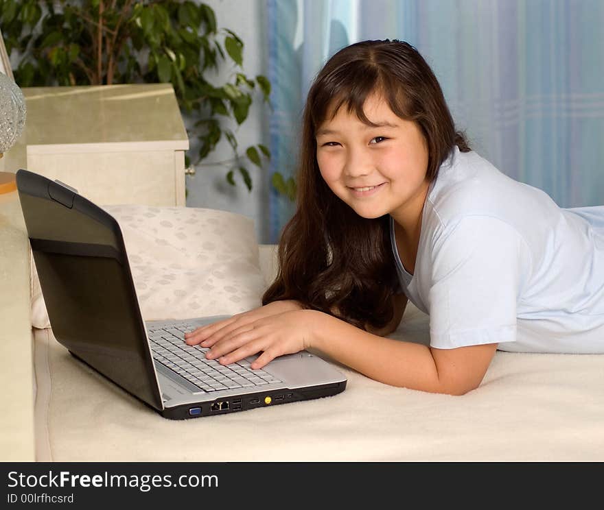 Smiling girl teenager with notebook. Smiling girl teenager with notebook.