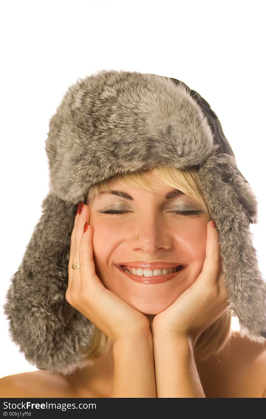 Girl in winter fur-cap