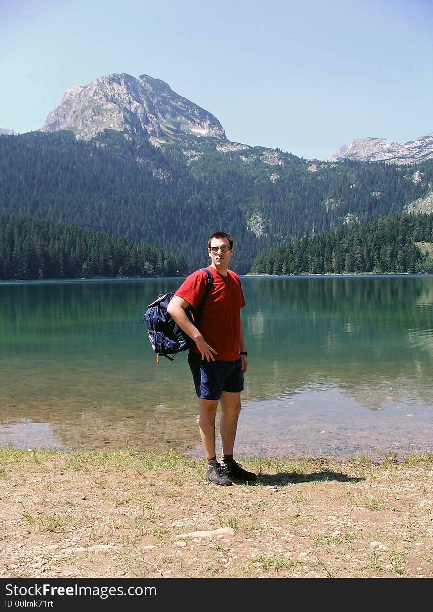 Man Hiking Near A Lake Of Durmitor Mountain