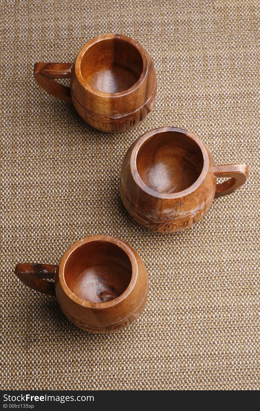 Three wooden cup