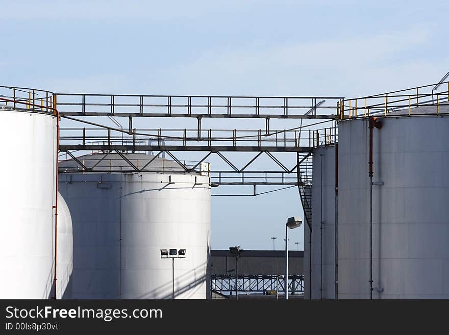 Large storage tanks on a clear day