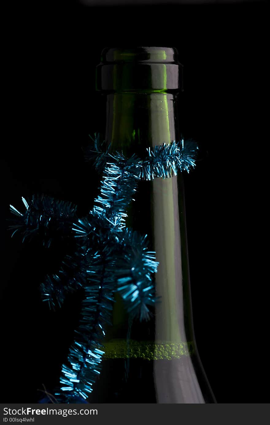 An adorned bottleneck. Concept for new years r christmas party. An adorned bottleneck. Concept for new years r christmas party