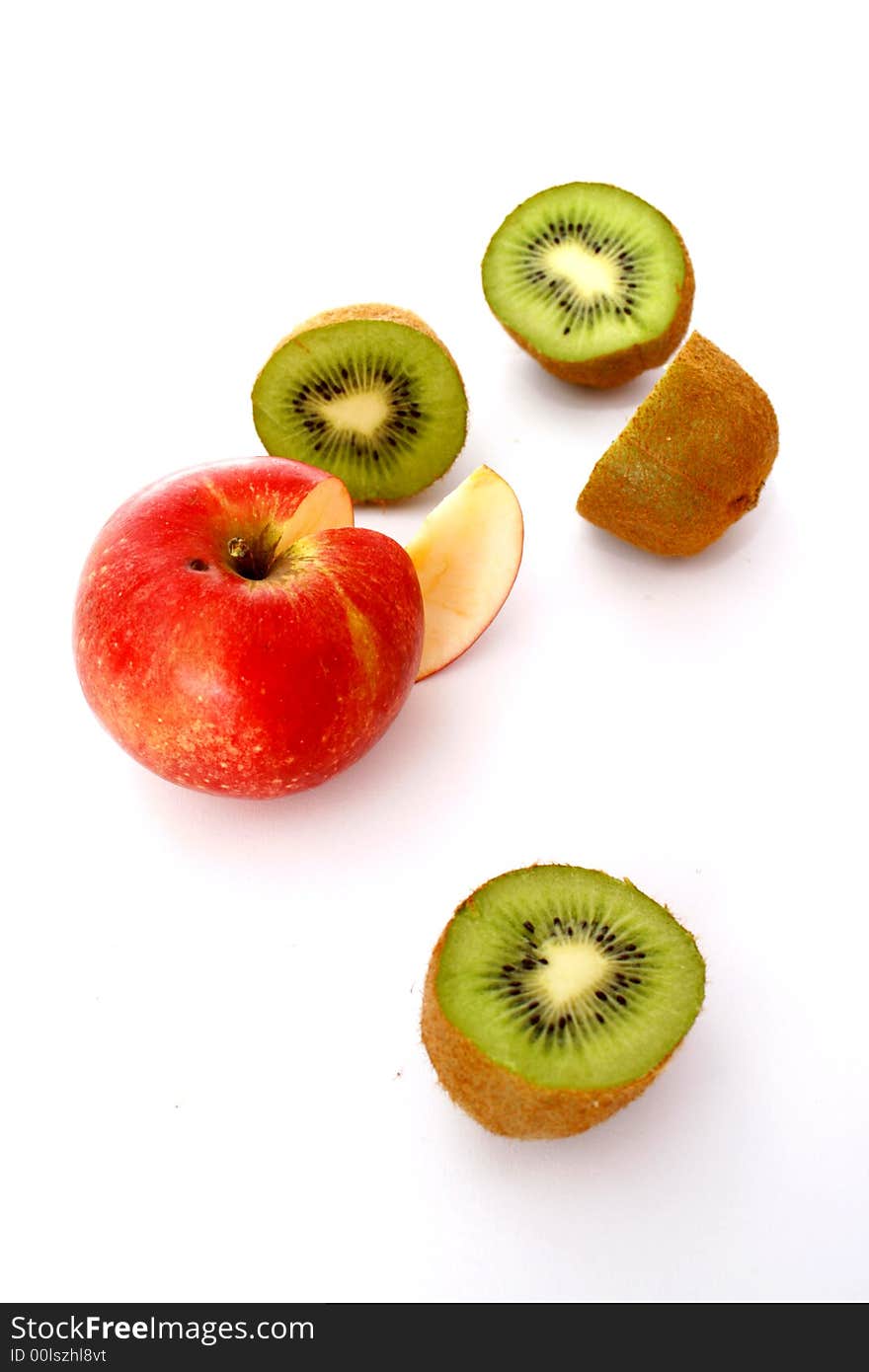 Green kiwi and a red apple. Green kiwi and a red apple