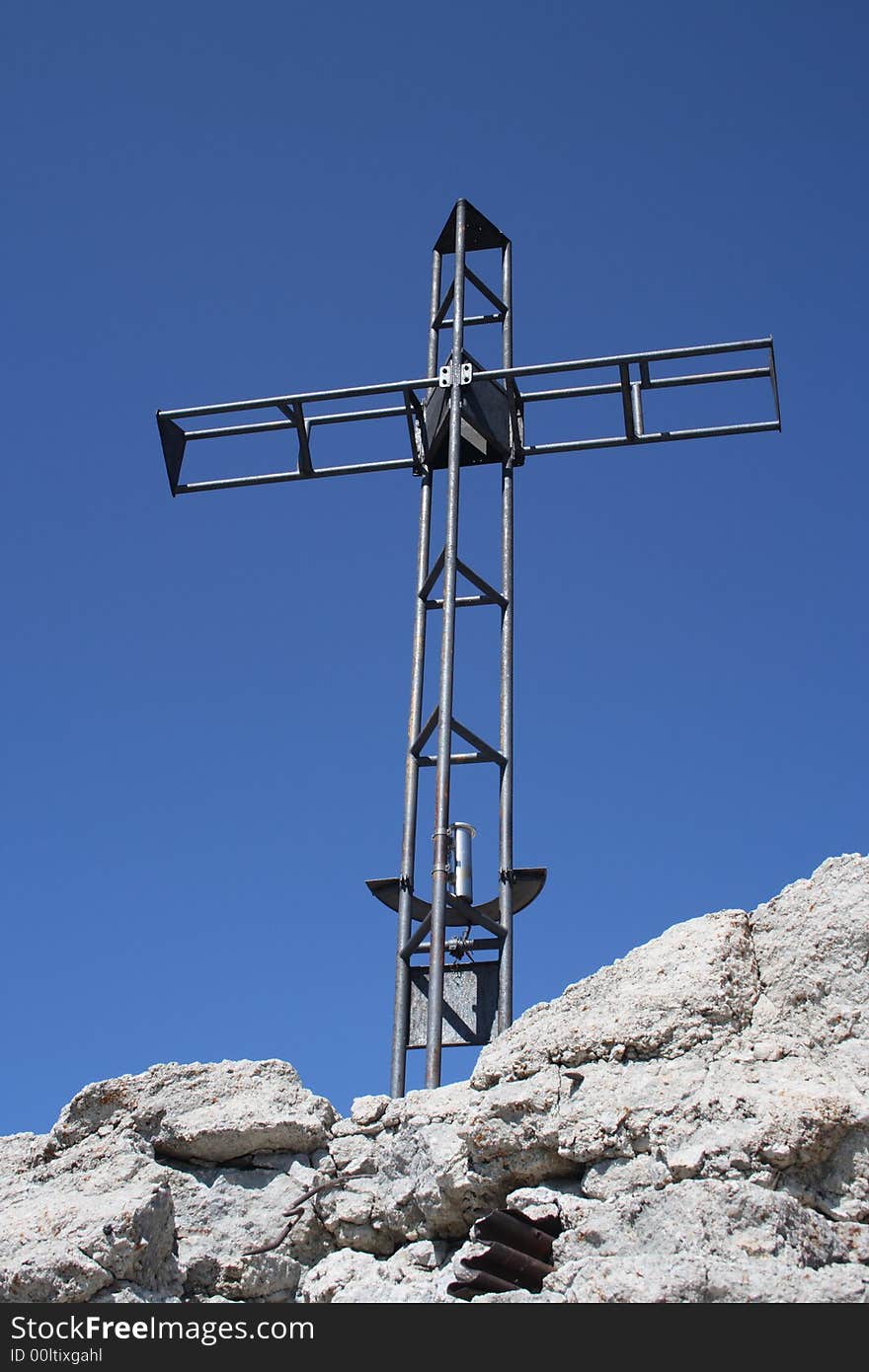 Cross on the summit of a mountain. Cross on the summit of a mountain