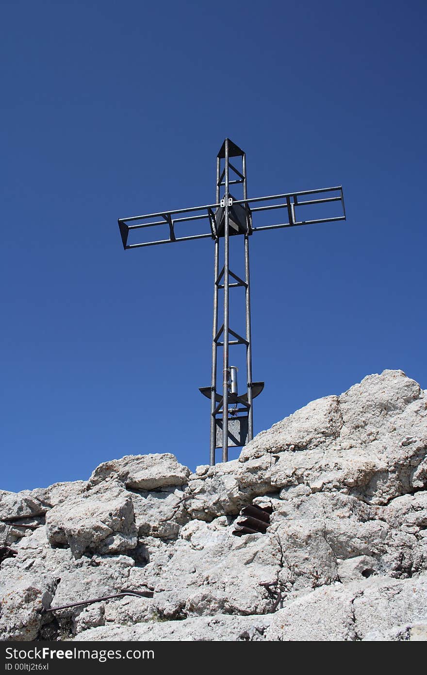 Cross on the summit of a mountain. Cross on the summit of a mountain