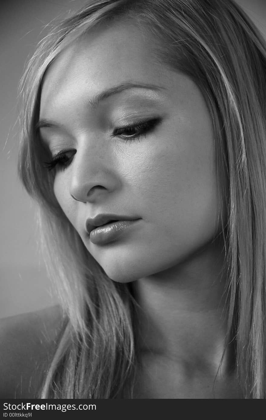 Black and white portrait of stunning young woman. Black and white portrait of stunning young woman.
