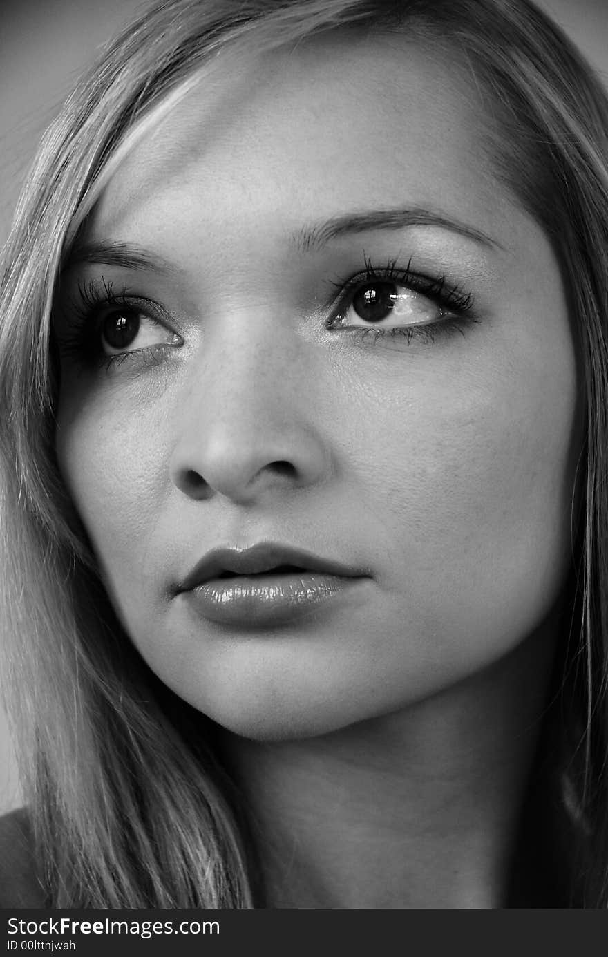 Black and white portrait of stunning young woman. Black and white portrait of stunning young woman.