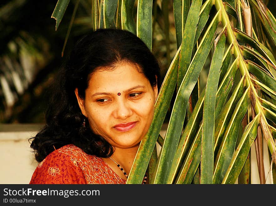 A portrait of woman getting peace and happiness in the company of nature. A portrait of woman getting peace and happiness in the company of nature.