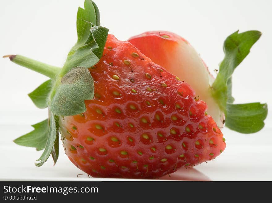 Sliced strawberry on a white backgorund