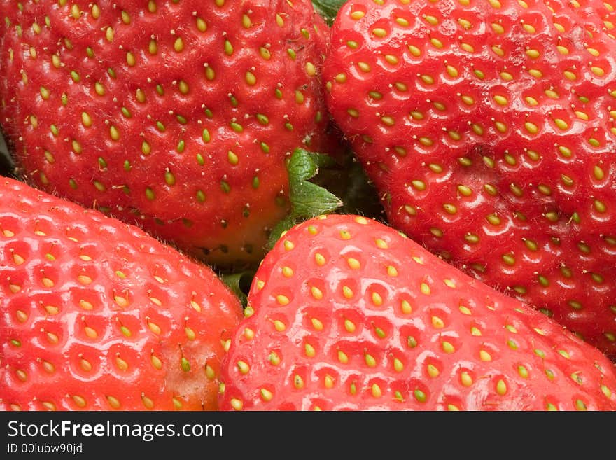 Strawberry close-up useful as background. Strawberry close-up useful as background