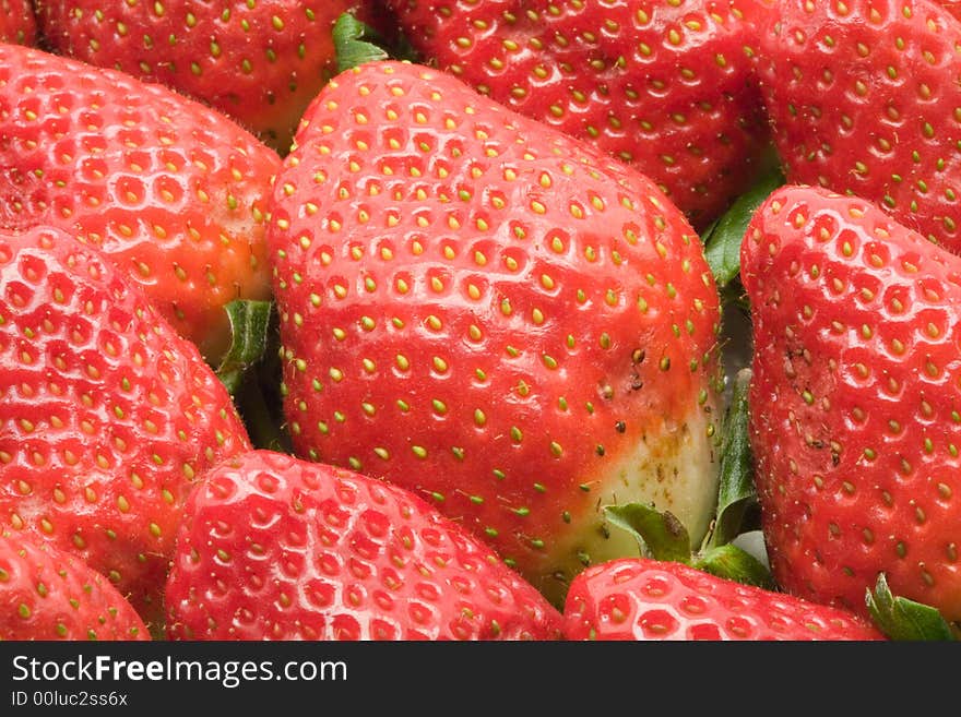 Strawberry close-up useful as background. Strawberry close-up useful as background