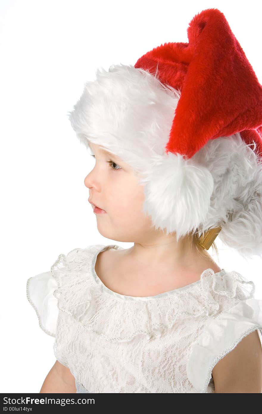 Pretty baby in santa claus christmas red hat over white background. Pretty baby in santa claus christmas red hat over white background