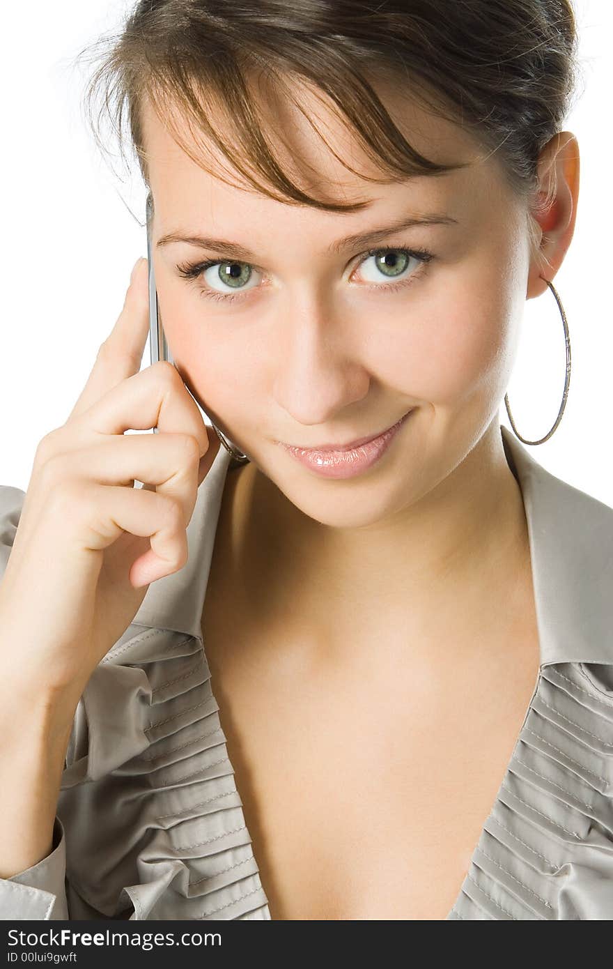 Attractive young woman calling by cellular phone  over white background. Attractive young woman calling by cellular phone  over white background