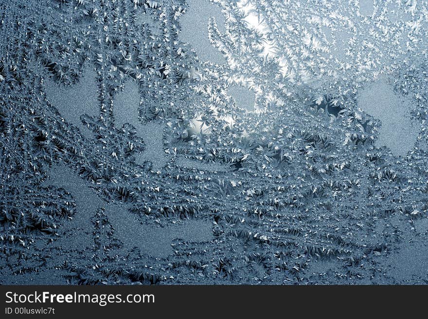 blue frosty pattern on windowpane