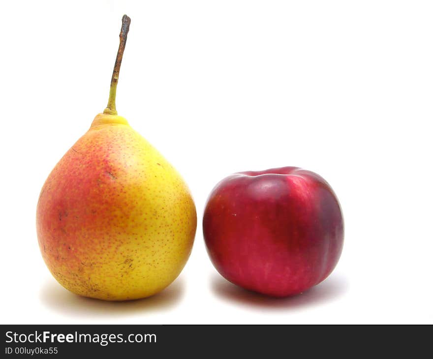 Beautiful, colorful pear. It has a tail. And red apple.
Isolated on a white background. Beautiful, colorful pear. It has a tail. And red apple.
Isolated on a white background.