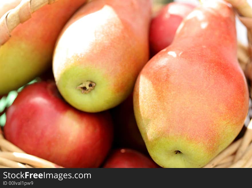 Ripe fresh pears in a basket