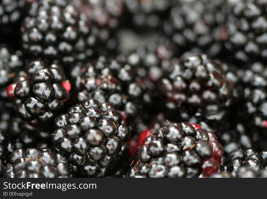 Fresh juicy blackberry, food background