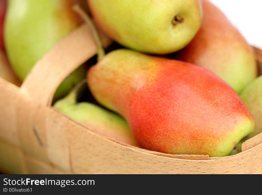 Ripe fresh pears in a basket