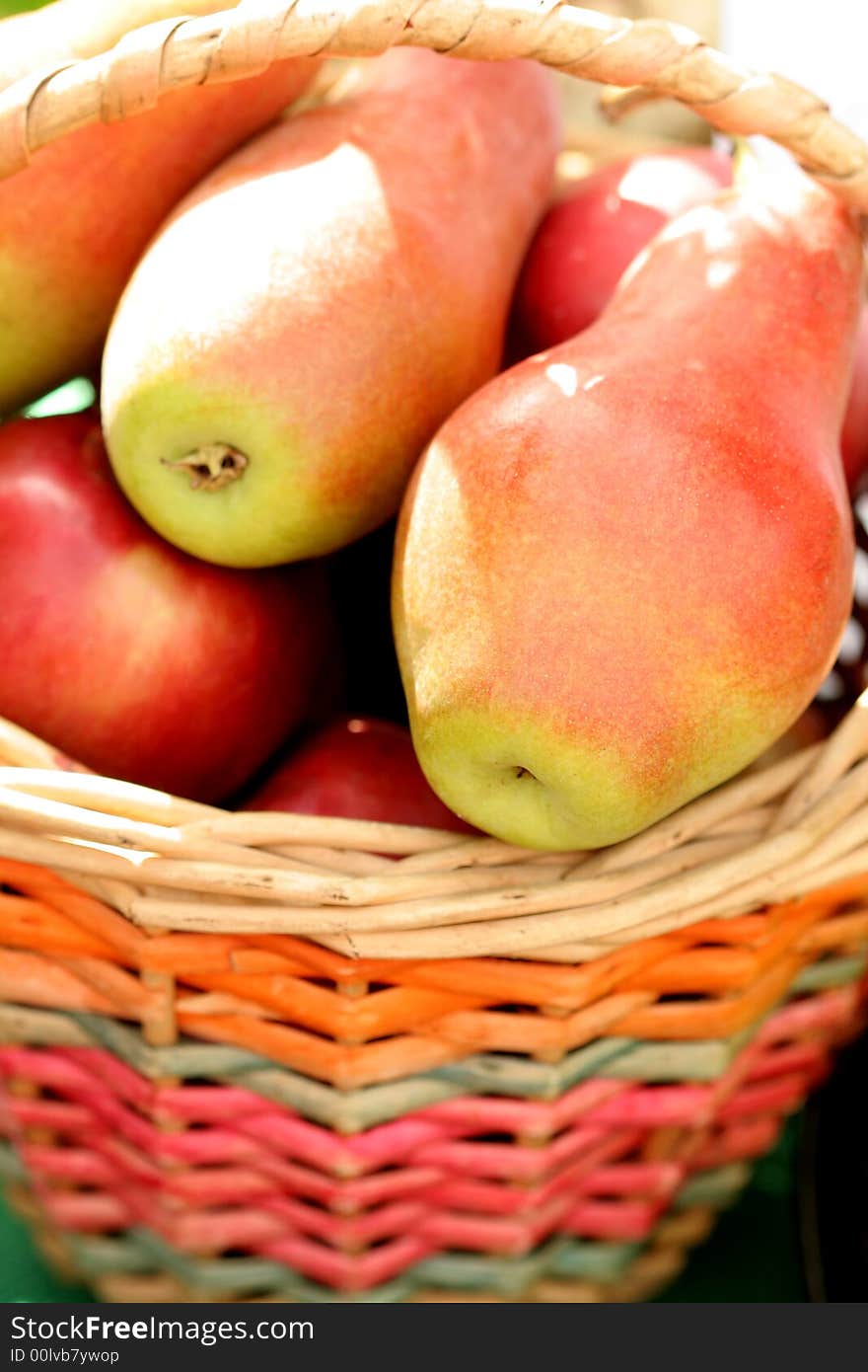 Ripe fresh pears in a basket