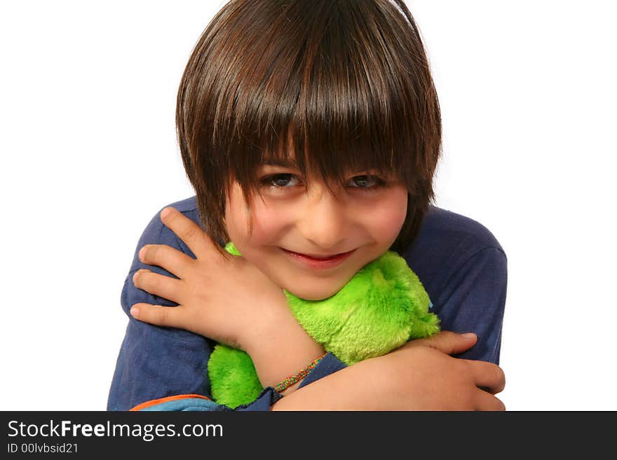 Little boy snuggle with his teddy. Little boy snuggle with his teddy.