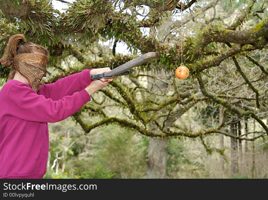 Smashing an apple on a string with a sword. Smashing an apple on a string with a sword