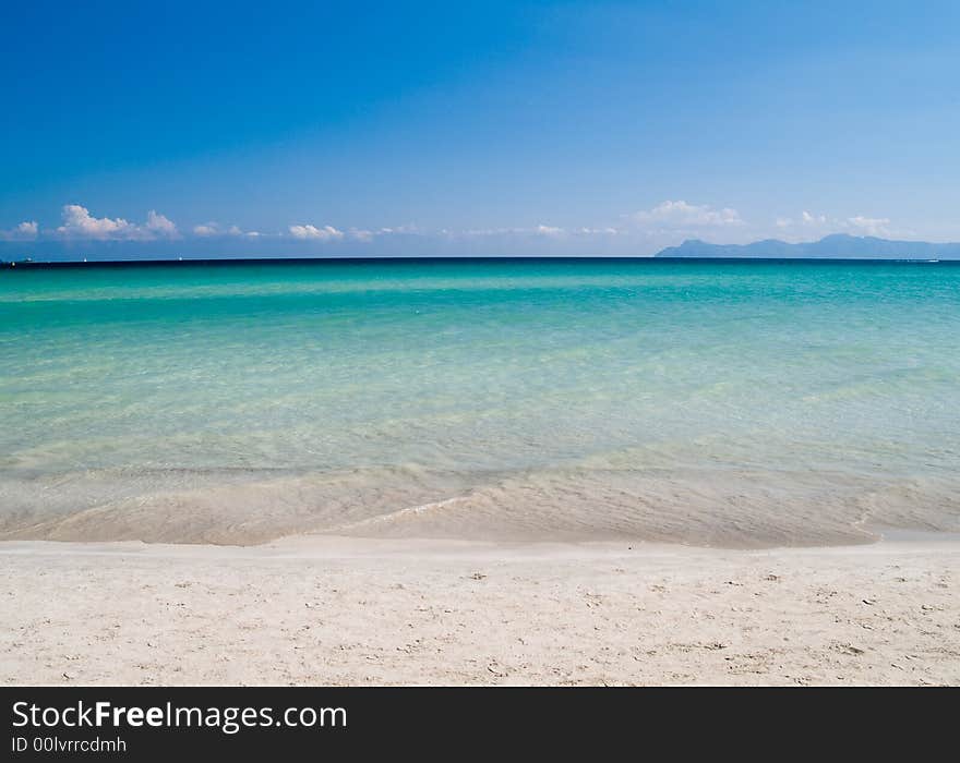 Perfect blue sea and white beach