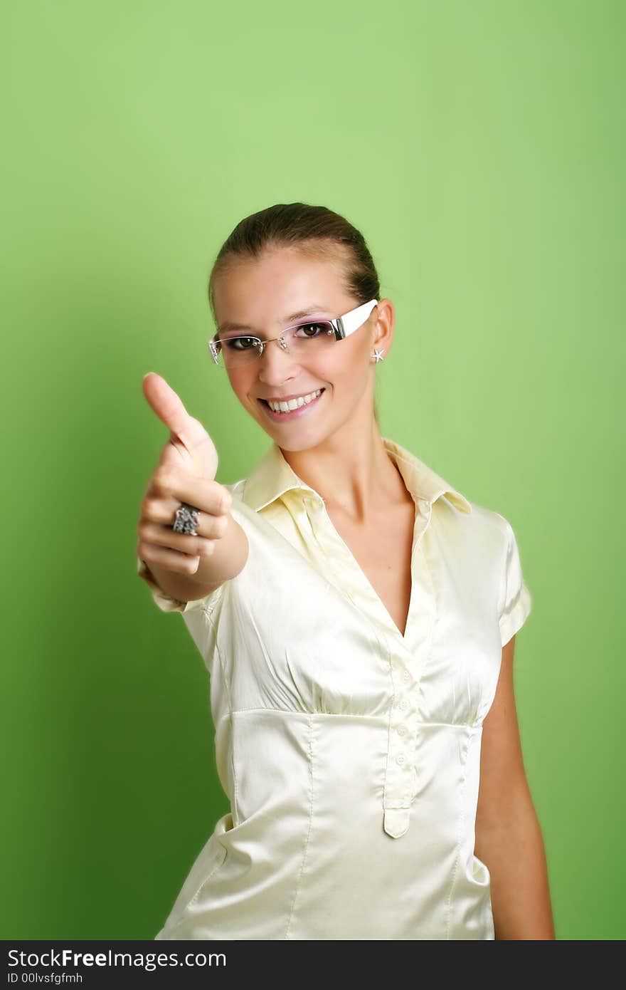 Business portrait of a young smiling and successful woman. Business portrait of a young smiling and successful woman