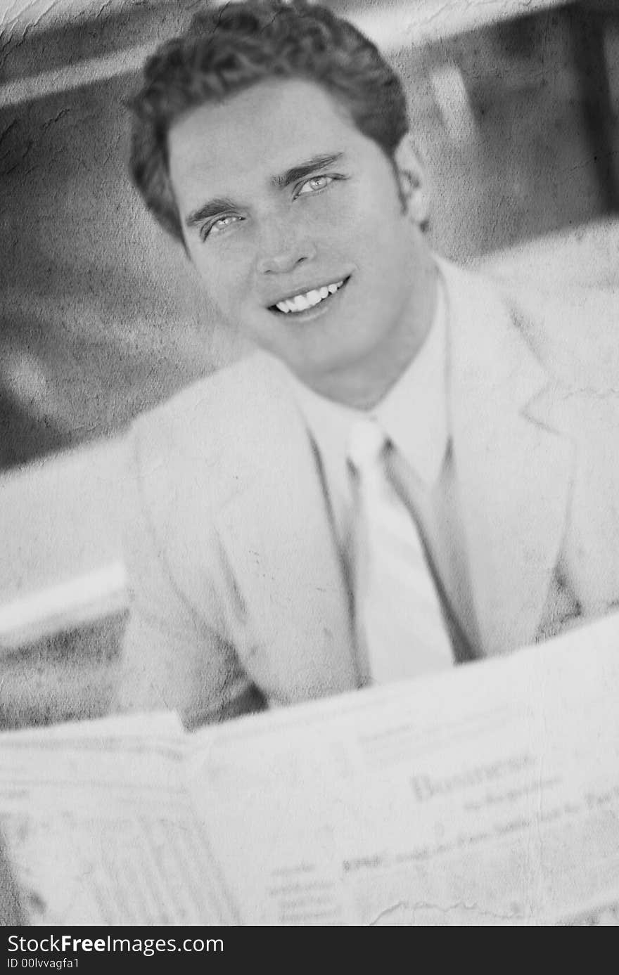 Black and white of portrait shot of one business man sitting down holding newspaper and looking at camera smiling. Black and white of portrait shot of one business man sitting down holding newspaper and looking at camera smiling