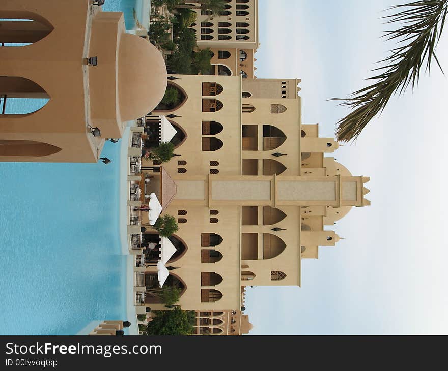 Architecture, pool, restaurant, arch, water, sky, hotel, Egypt, palm trees, trees, chair, Makadi Bay, Makadi Palace, bridge, lifebuoy ring, girl, woman. Architecture, pool, restaurant, arch, water, sky, hotel, Egypt, palm trees, trees, chair, Makadi Bay, Makadi Palace, bridge, lifebuoy ring, girl, woman