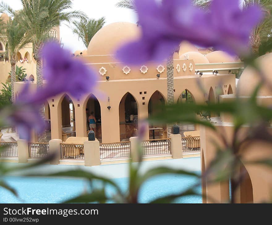 Architecture, pool, restaurant, arch, water, sky, hotel, Egypt, palm trees, trees, chair, Makadi Bay, Makadi Palace, bridge, lifebuoy ring, girl, woman. Architecture, pool, restaurant, arch, water, sky, hotel, Egypt, palm trees, trees, chair, Makadi Bay, Makadi Palace, bridge, lifebuoy ring, girl, woman