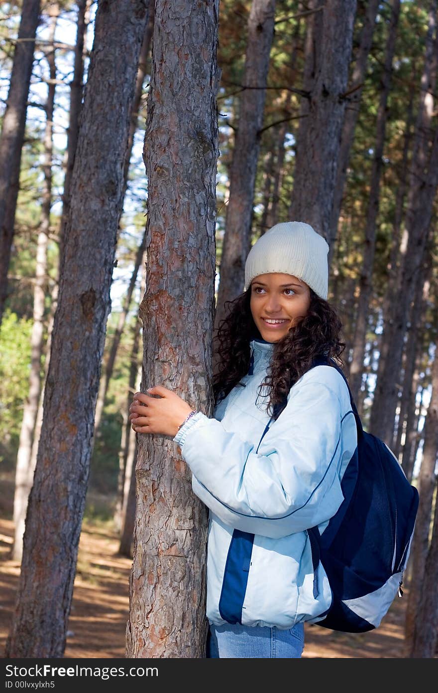 Beautiful winter girl in blue jacket