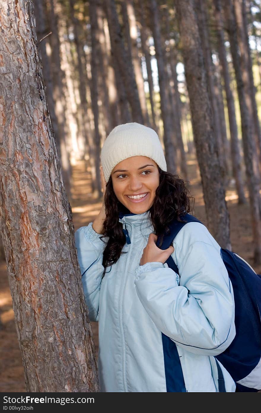 Beautiful winter girl in blue jacket