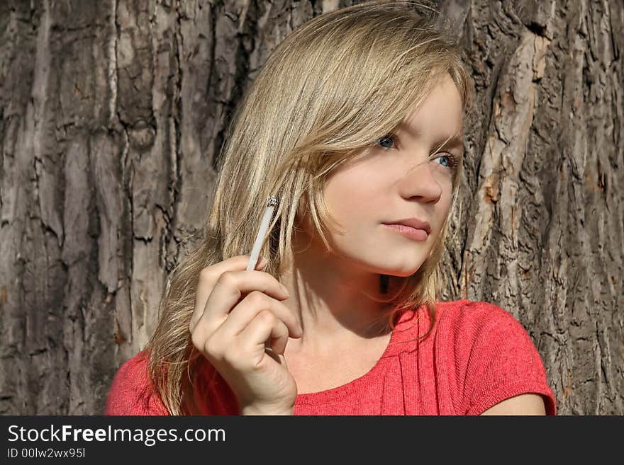 Blond girl with a cigarette