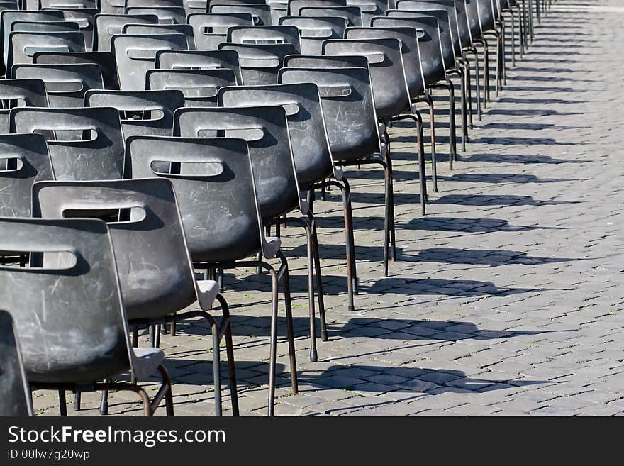 Empty chairs at the square