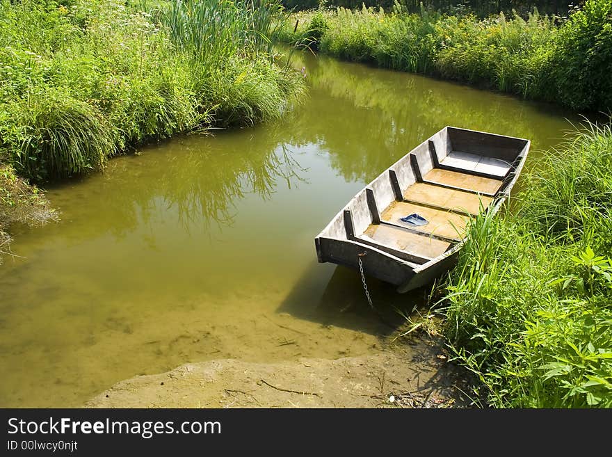 Boat detail in pond, River Drava, Croatia