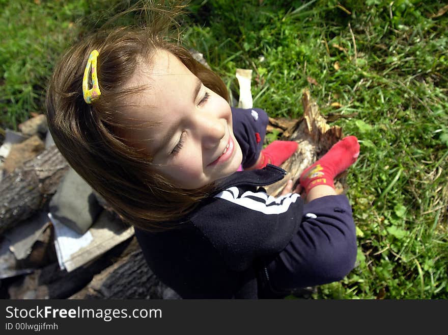 Little girl being silly on grass field. Little girl being silly on grass field