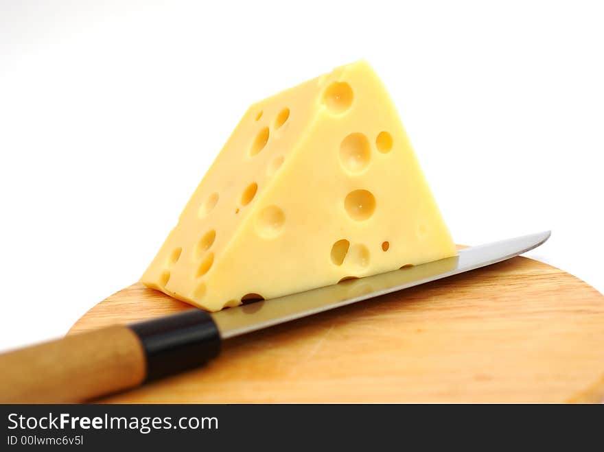 Piece of cheese on a white background