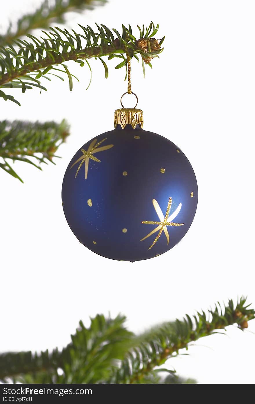 Blue glass ball on tree