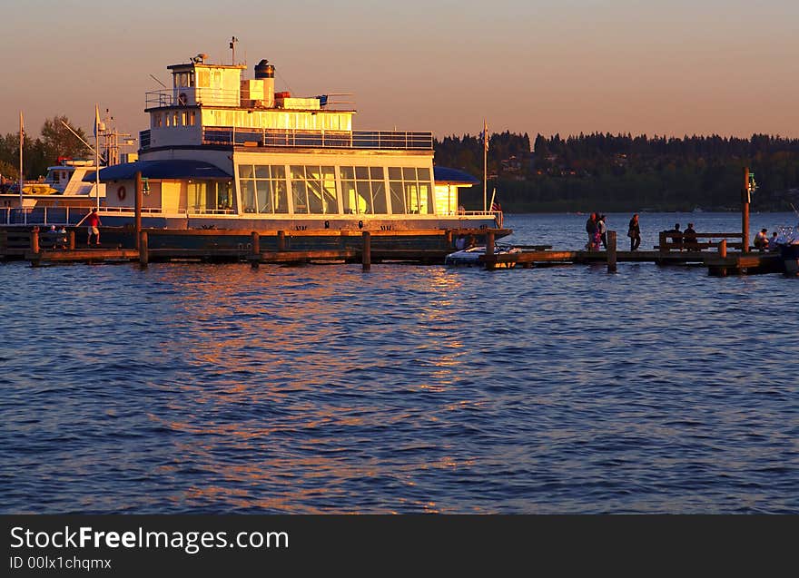 Tour Boat At Sunset