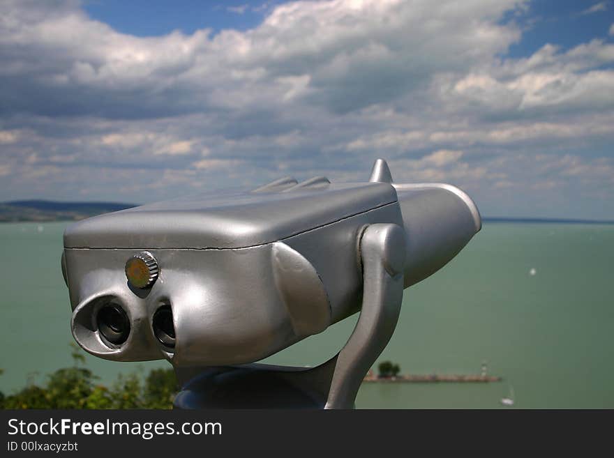 Binoculars with clouds