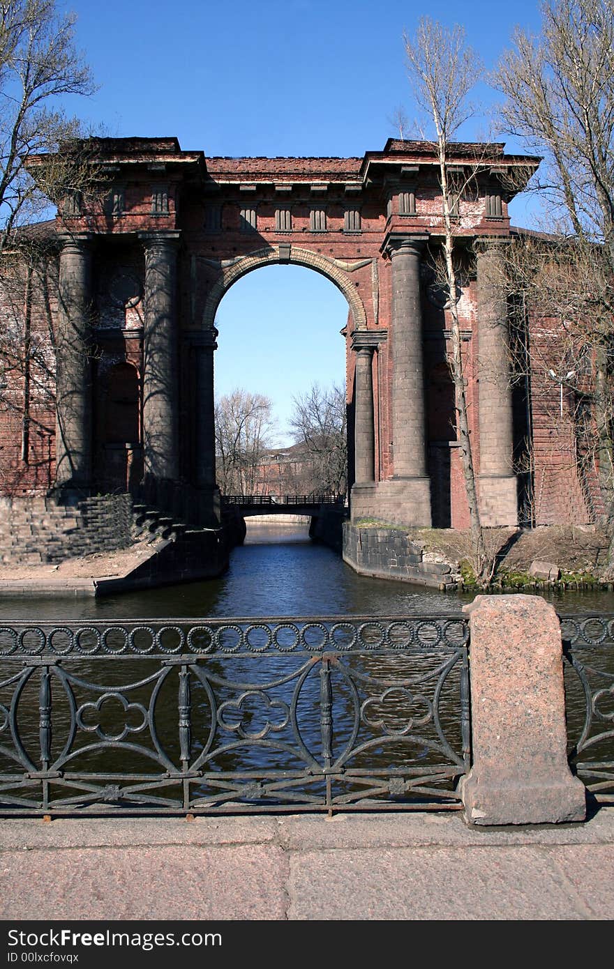 Ancient architectural arch in St.-Petersburg in Russia. Architectural sight of city. Ancient architectural arch in St.-Petersburg in Russia. Architectural sight of city.