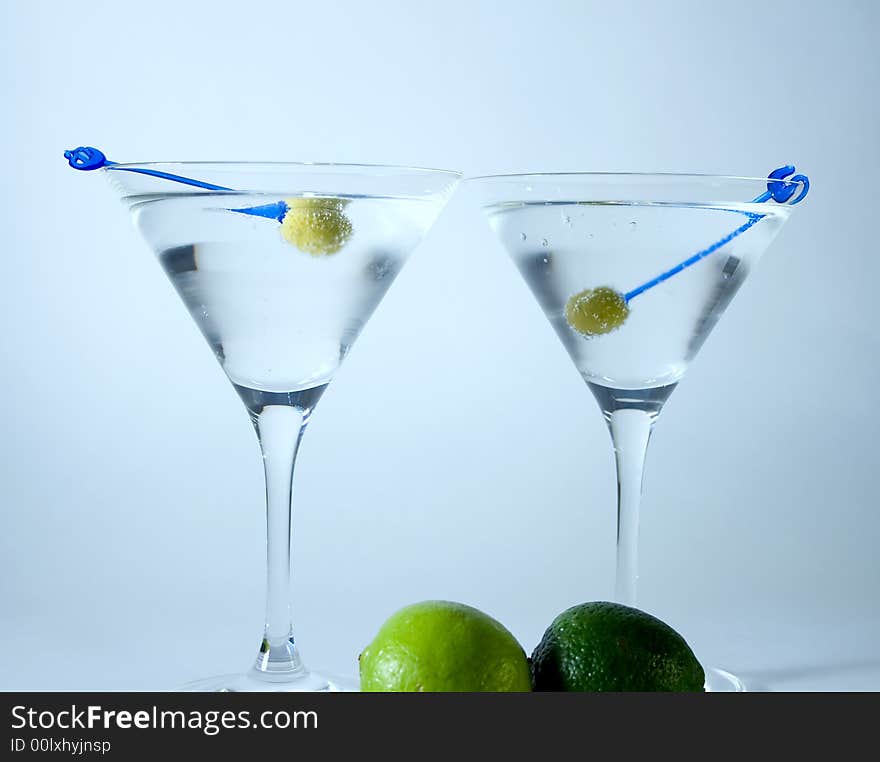 Cocktail glasses with olives