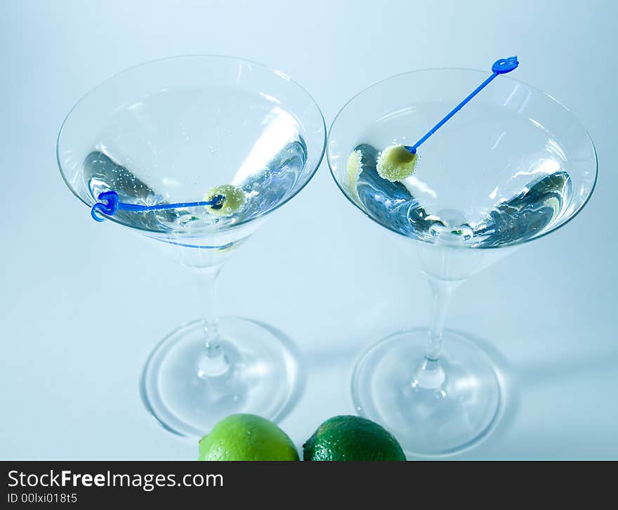 Cocktail glasses with olives c